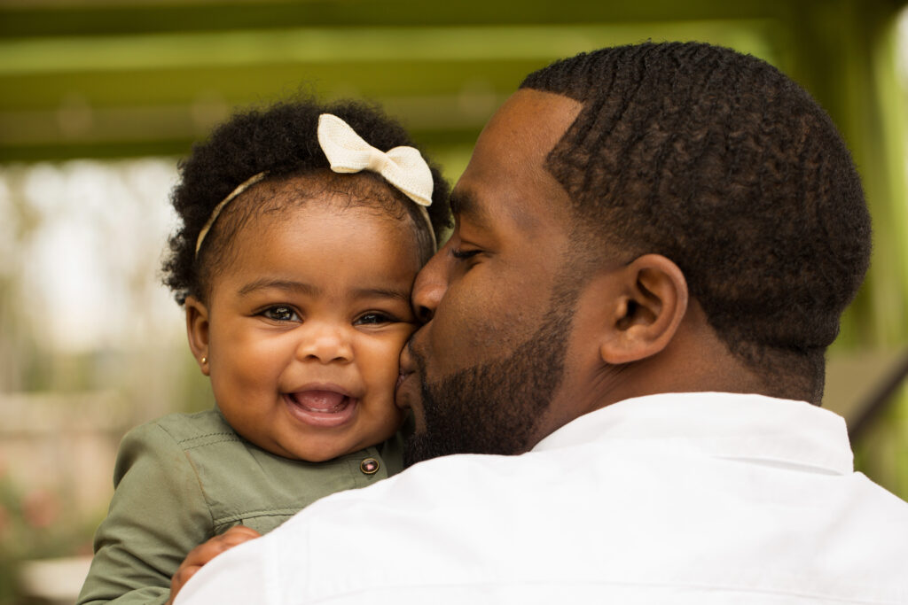 Pai e filha afro-americanos