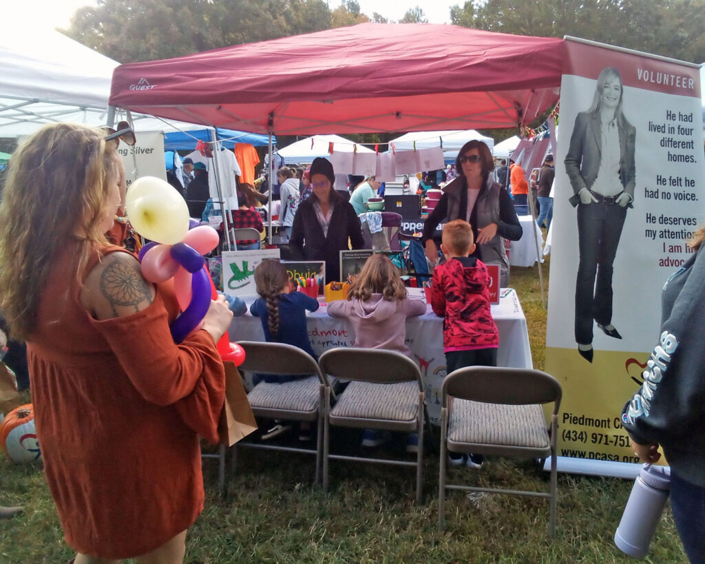 Kids drawing up a storm for CASA at the Louisa County Fall Harvest Festival. 10.8.22